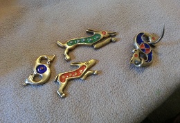 Enamled brooches